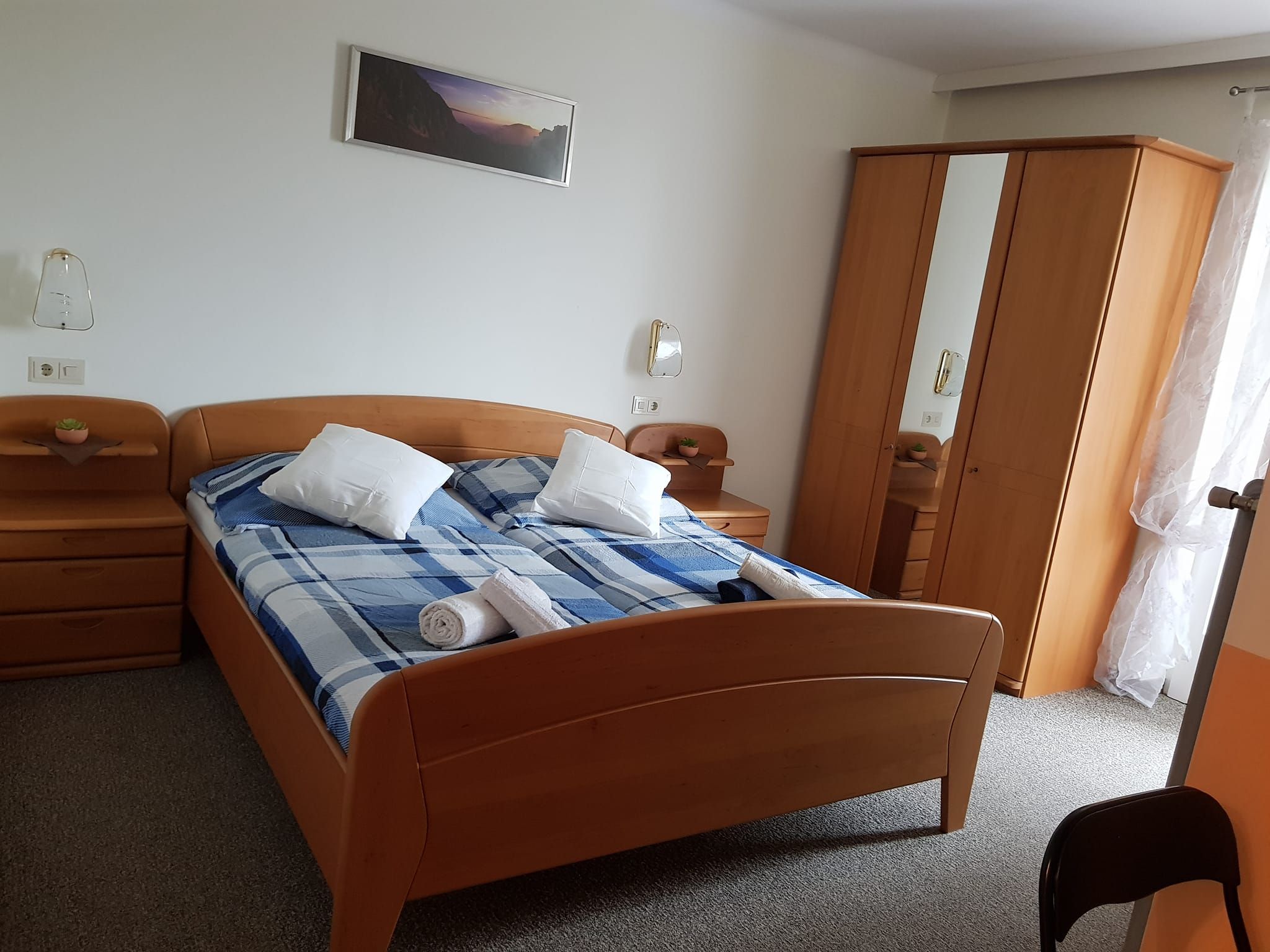 Helles Doppelzimmer mit Balkon